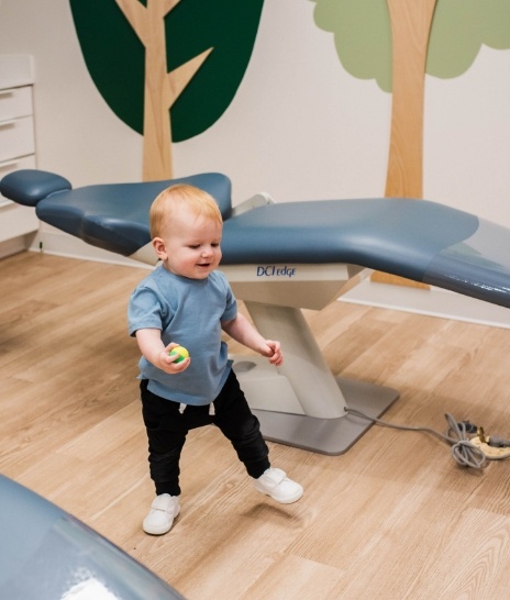 Child smiling during dental checkup