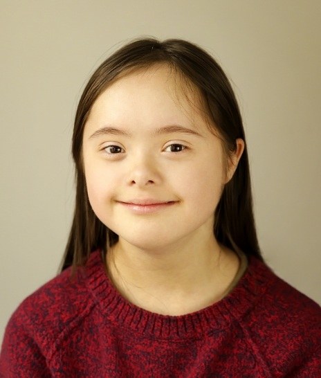 Young girl with special needs smiling