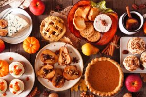 Table filled with Thanksgiving desserts