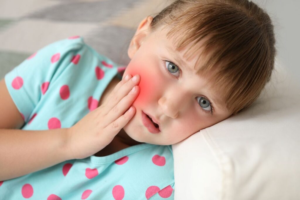 A little girl with a toothache
